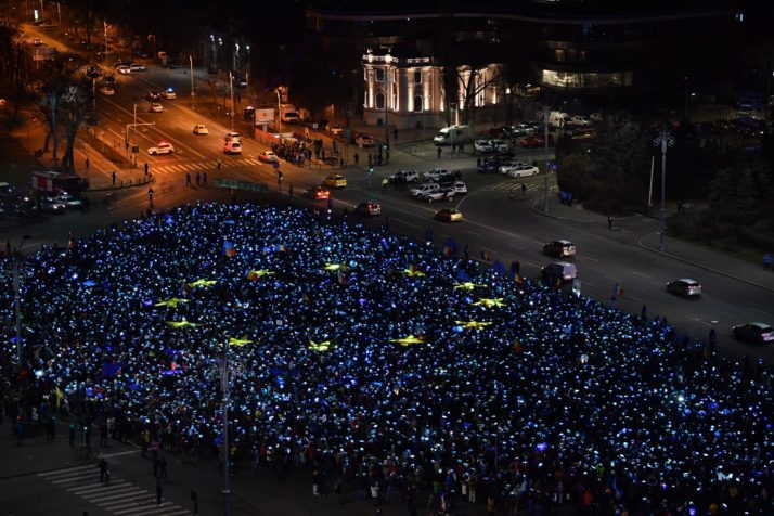 A EU flag made out of lights by around 6000 people in front of the Romanian government headquarters in Bucharest, Romania is pictured on February 26, 2017. Protesters gather for the 27th day in a row asking for the Grindeanu cabinet to resign. / AFP / Daniel MIHAILESCU (Photo credit should read DANIEL MIHAILESCU/AFP/Getty Images)